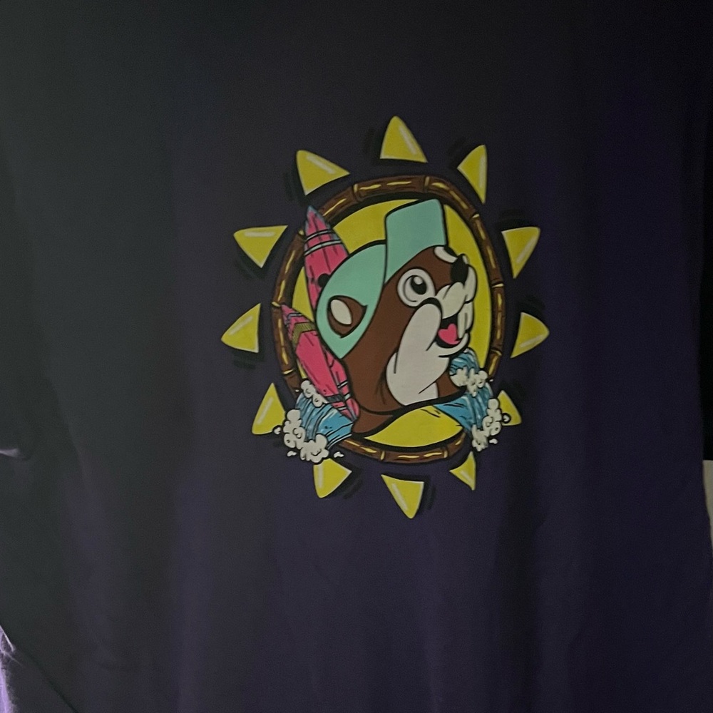 Bucees Purple Graphic T-Shirt with Cartoon Design